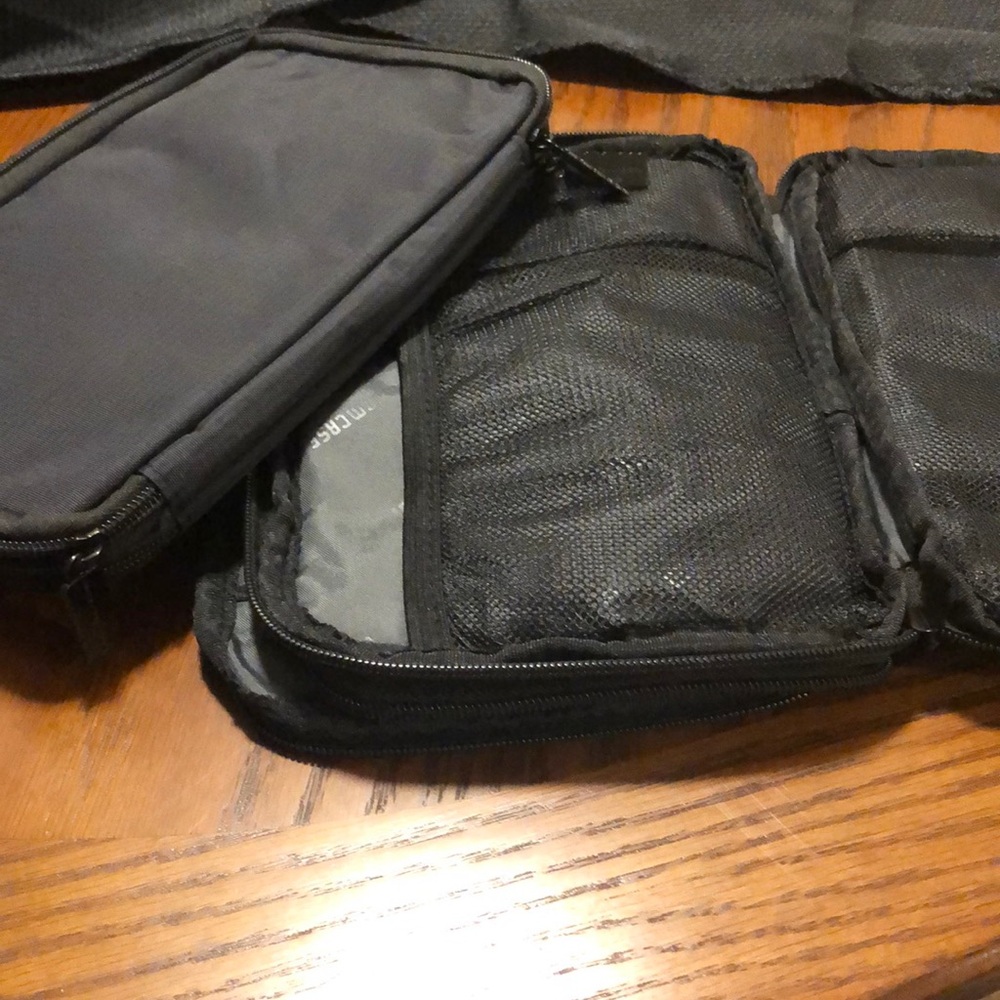 Two NWOT BUBM carrying cases.